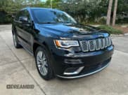 ✅ 2018 Jeep Grand Cherokee Summit • VIN: 1C4RJFJG4JC218011 • Lot: 91515965. Listed on Copart with 140,761 mi. Free auction sales archive from the USA and detailed vehicle history report at DreamBid. Image 1.