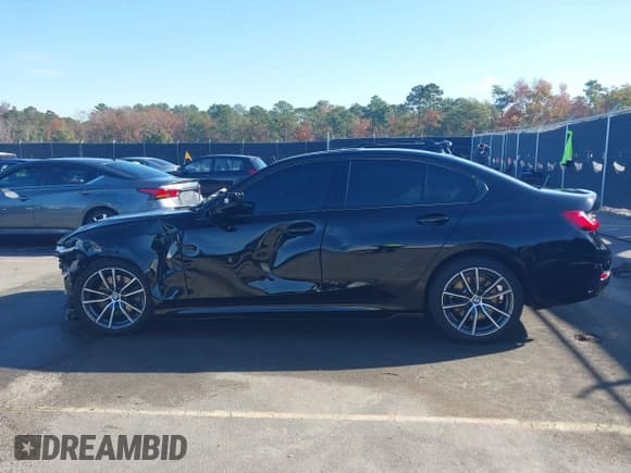 ✅ 2021 BMW 3 Series 330i • VIN: 3MW5R1J02M8C00810 • Lot: 43664365. Listed on IAAI with 48,765 mi. Free auction sales archive from the USA and detailed vehicle history report at DreamBid. Image 15.