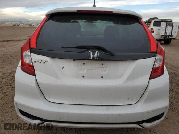 ✅ 2019 Honda Fit LX • VIN: 3HGGK5H41KM702276 • Лот: 86455335. Опубликован ранее на Copart с пробегом 88 927 миль. Бесплатный доступ к архиву аукционных продаж из США и подробный отчёт об истории автомобиля на DreamBid. Изображение 6.