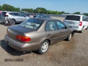 ✅ 2000 Chevrolet Prizm • VIN: 1Y1SK5280YZ426387 • Lot: 42804574. Listed on IAAI with 175,523 mi. Free auction sales archive from the USA and detailed vehicle history report at DreamBid. Image 4.