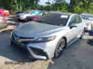 2021 Toyota Camry SE with VIN 4T1T11BK9MU021342, listed as a IAAI auction lot 42947451 with 71,105 mi miles and . Bid and sale history available at DreamBid. Image 2.