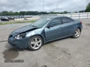 ✅ 2006 Pontiac G6 GTP • VIN: 1G2ZM551264217310 • Лот: 60116035. Опубликован ранее на Copart с пробегом 66 452 миль. Бесплатный доступ к архиву аукционных продаж из США и подробный отчёт об истории автомобиля на DreamBid. Изображение 1.