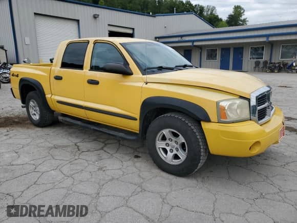 2006 Dodge Dakota SLT с VIN 1D7HW48N26S561263, выставлен на аукционе Copart как лот 68012204 с пробегом 141 041 миль миль и Списание • Salvage title. История ставок и продаж доступна на DreamBid. Изображение 4.
