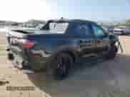 2024 Hyundai Santa Cruz Night Edition с VIN 5NTJCDDF7RH124723, выставлен на аукционе Copart как лот 85422844 с пробегом 5 545 миль миль и Списание • Salvage title. История ставок и продаж доступна на DreamBid. Изображение 3.