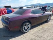✅ 2022 Dodge Challenger SXT • VIN: 2C3CDZGG7NH234412 • Lot: 42116869. Listed on IAAI with 61,853 mi. Free auction sales archive from the USA and detailed vehicle history report at DreamBid. Image 4.