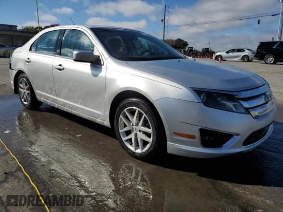 ✅ 2012 Ford Fusion SEL • VIN: 3FAHP0JG1CR443987 • Lot: 91048065. Listed on Copart with 119,647 mi. Free auction sales archive from the USA and detailed vehicle history report at DreamBid. Image 4.