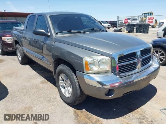 2007 Dodge Dakota Laramie with VIN 1D7HE58N17S160524, listed as a IAAI auction lot 42884532 with 166,814 mi miles and . Bid and sale history available at DreamBid. Image 1.
