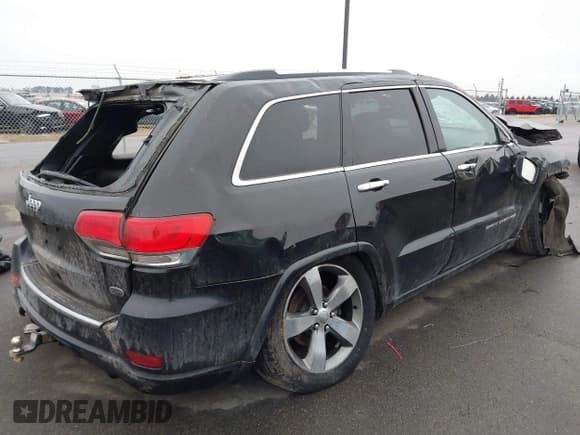 ✅ 2015 Jeep Grand Cherokee Overland • VIN: 1C4RJFCG3FC665854 • Lot: 41697999. Listed on IAAI with 206,618 mi. Free auction sales archive from the USA and detailed vehicle history report at DreamBid. Image 4.