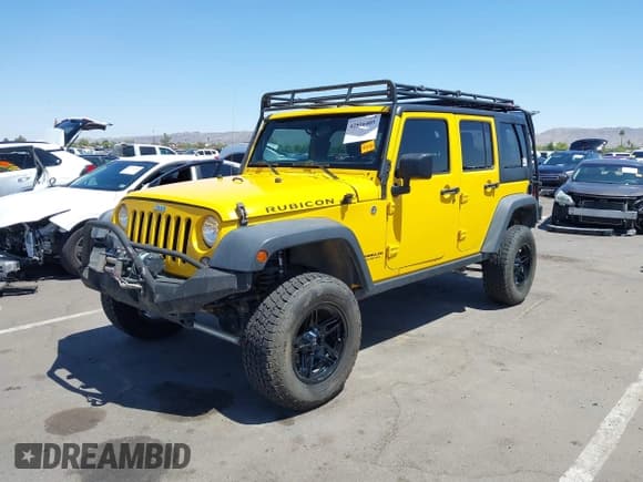 ✅ 2015 Jeep Wrangler Unlimited Rubicon • VIN: 1C4BJWFG9FL593183 • Lot: 42516405. Listed on IAAI with 82,992 mi. Free auction sales archive from the USA and detailed vehicle history report at DreamBid. Image 2.