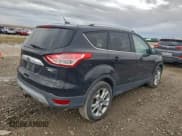 ✅ 2015 Ford Escape Titanium • VIN: 1FMCU9J97FUA09214 • Lot: 95205245. Listed on Copart with 96,350 mi. Free auction sales archive from the USA and detailed vehicle history report at DreamBid. Image 3.