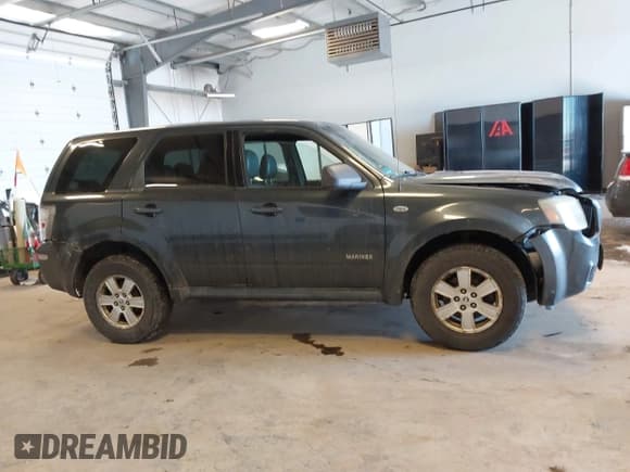 ✅ 2008 Mercury Mariner • VIN: 4M2CU81158KJ14013 • Лот: 41305863. Опубликован ранее на IAAI с пробегом 229 672 миль. Бесплатный доступ к архиву аукционных продаж из США и подробный отчёт об истории автомобиля на DreamBid. Изображение 13.