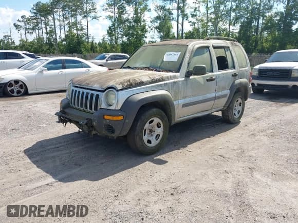 ✅ 2003 Jeep Liberty Sport • VIN: 1J4GK48K33W575212 • Лот: 42847564. Опубликован ранее на IAAI с пробегом 161 948 миль. Бесплатный доступ к архиву аукционных продаж из США и подробный отчёт об истории автомобиля на DreamBid. Изображение 2.