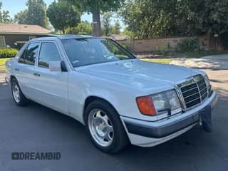 ✅ 1992 Mercedes-Benz 400 E • VIN: WDBEA34E4NB705887 • Лот: 65290115. Опубликован ранее на Copart с пробегом 76 708 миль. Бесплатный доступ к архиву аукционных продаж из США и подробный отчёт об истории автомобиля на DreamBid. Изображение 1.