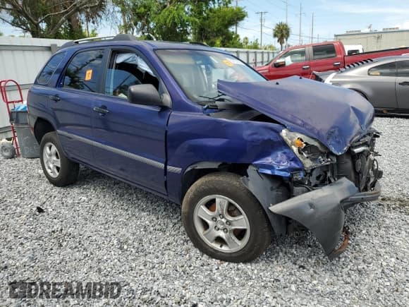 ✅ 2006 Kia Sportage LX • VIN: KNDJF724867185961 • Lot: 62757265. Listed on Copart with Not provided. Free auction sales archive from the USA and detailed vehicle history report at DreamBid. Image 4.