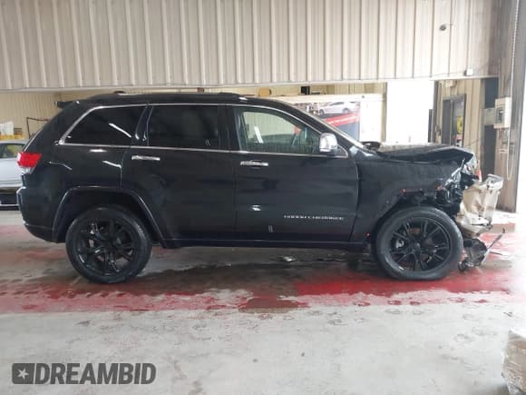 ✅ 2014 Jeep Grand Cherokee Overland • VIN: 1C4RJFCG8EC339255 • Lot: 43575140. Wystawiony na IAAI z przebiegiem 122 893 mil. Bezpłatny archiwum sprzedaży aukcyjnych z USA i szczegółowy raport historii pojazdu na DreamBid. Zdjęcie 13.