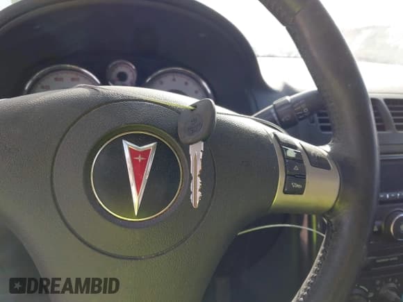 ✅ 2009 Pontiac G5 • VIN: 1G2AS18H497228543 • Lot: 43386314. Listed on IAAI with 213,241 mi. Free auction sales archive from the USA and detailed vehicle history report at DreamBid. Image 11.