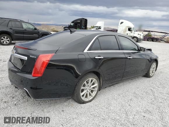 ✅ 2017 Cadillac CTS AWD • VIN: 1G6AW5SX5H0188734 • Лот: 82203064. Опубликован ранее на Copart с пробегом 115 531 миль. Бесплатный доступ к архиву аукционных продаж из США и подробный отчёт об истории автомобиля на DreamBid. Изображение 3.