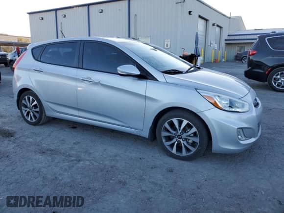 ✅ 2015 Hyundai Accent Sport • VIN: KMHCU5AE0FU201483 • Lot: 80882664. Listed on Copart with 66,292 mi miles. Access the free auction sales archive from the USA and view a detailed vehicle history report at DreamBid. Image 4.