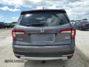 ✅ 2021 Honda Pilot Touring 8-Passenger • VIN: 5FNYF6H96MB012412 • Lot: 84603215. Listed on Copart with 123,183 mi. Free auction sales archive from the USA and detailed vehicle history report at DreamBid. Image 6.