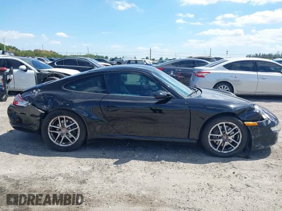 ✅ 2006 Porsche 911 Carrera 997 • VIN: WP0AA299X6S715220 • Lot: 42049905. Wystawiony na IAAI z przebiegiem 85 649 mil. Bezpłatny archiwum sprzedaży aukcyjnych z USA i szczegółowy raport historii pojazdu na DreamBid. Zdjęcie 13.