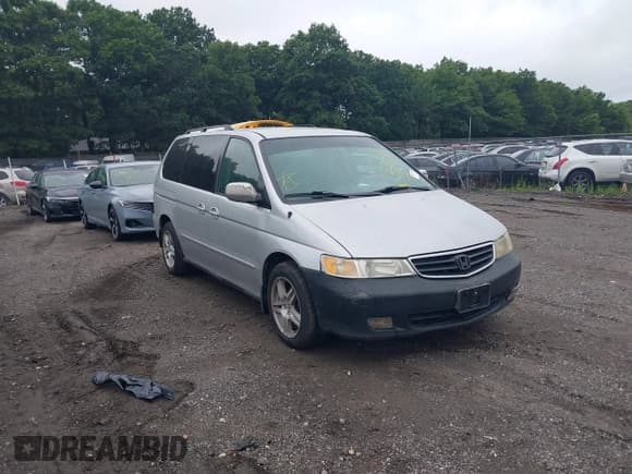 ✅ 2003 Honda Odyssey EX • VIN: 5FNRL18623B051129 • Lot: 40065538. Listed on IAAI with Not provided. Free auction sales archive from the USA and detailed vehicle history report at DreamBid. Image 1.
