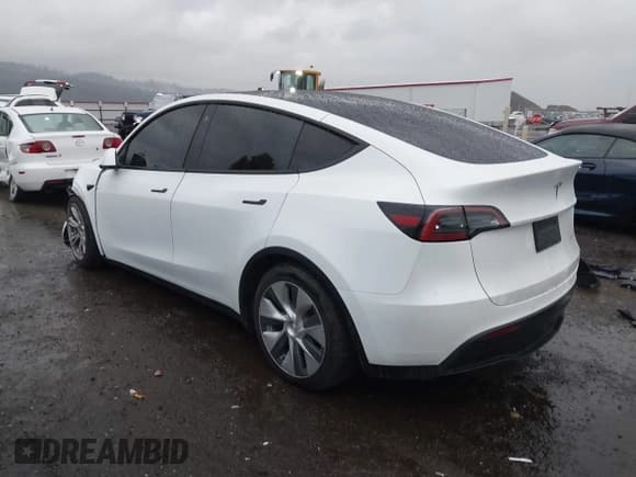 ✅ 2022 Tesla Model Y Long Range • VIN: 7SAYGAEE2NF384464 • Lot: 43618517. Listed on IAAI with 66,844 mi. Free auction sales archive from the USA and detailed vehicle history report at DreamBid. Image 3.