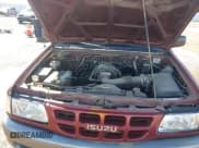 ✅ 2002 Isuzu Rodeo S • VIN: 4S2CK58W524328785 • Lot: 43751289. Listed on IAAI with 186,198 mi. Free auction sales archive from the USA and detailed vehicle history report at DreamBid. Image 10.