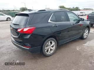 2018 Chevrolet Equinox Premier с VIN 2GNAXVEV8J6262687, выставлен на аукционе IAAI как лот 43275439 с пробегом 159 141 миль миль и . История ставок и продаж доступна на DreamBid. Изображение 4.