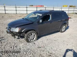 2015 Dodge Journey SXT z VIN 3C4PDCBG4FT595221, wystawiony jako Copart lot #81013555 z przebiegiem 108 636 mil mil oraz Szkoda całkowita • Salvage title. Historia ofert i sprzedaży dostępna na DreamBid. Obrazek 1.