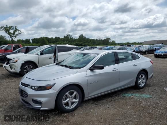 2018 Chevrolet Malibu LS with VIN 1G1ZB5ST0JF131958, listed as a Copart auction lot 64519365 with 93,785 mi miles and Salvage title. Bid and sale history available at DreamBid. Image 1.