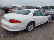 ✅ 1999 Chrysler LHS • VIN: 2C3HC56G0XH626928 • Lot: 42988849. Listed on IAAI with 68,956 mi. Free auction sales archive from the USA and detailed vehicle history report at DreamBid. Image 4.