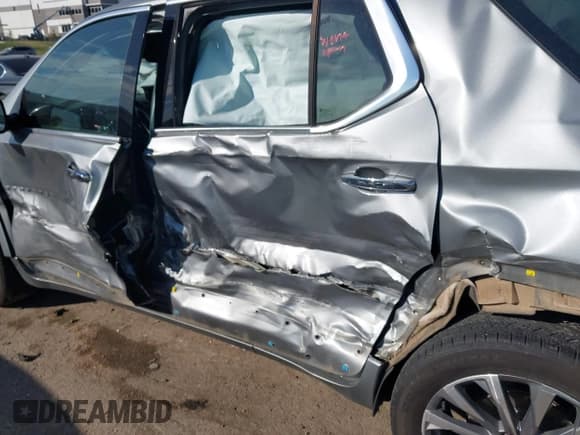 ✅ 2023 Chevrolet Traverse Premier • VIN: 1GNERKKW4PJ303710 • Lot: 43462859. Listed on IAAI with 32,061 mi. Free auction sales archive from the USA and detailed vehicle history report at DreamBid. Image 6.