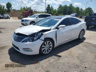 ✅ 2013 Hyundai Azera • VIN: KMHFH4JG0DA311025 • Лот: 66824195. Опубликован ранее на Copart с пробегом 166 321 миль. Бесплатный доступ к архиву аукционных продаж из США и подробный отчёт об истории автомобиля на DreamBid. Изображение 1.