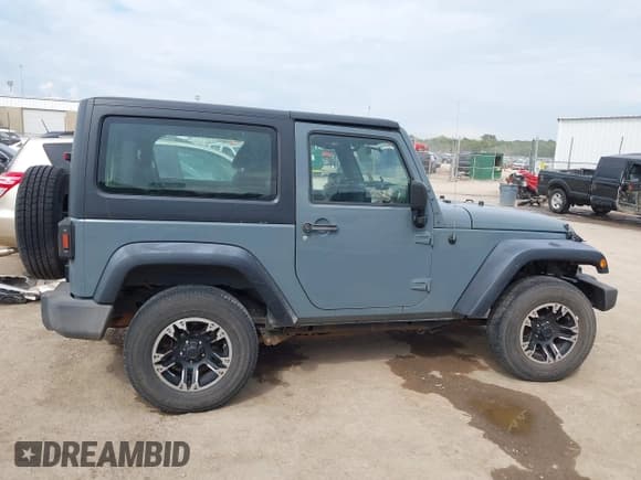 ✅ 2015 Jeep Wrangler Sport • VIN: 1C4AJWAG8FL723991 • Lot: 43256690. Listed on IAAI with 131,170 mi. Free auction sales archive from the USA and detailed vehicle history report at DreamBid. Image 13.