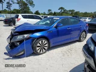 ✅ 2013 Kia Optima SX • VIN: 5XXGR4A6XDG157084 • Lot: 43384285. Listed on Copart with 189,415 mi. Free auction sales archive from the USA and detailed vehicle history report at DreamBid. Image 1.