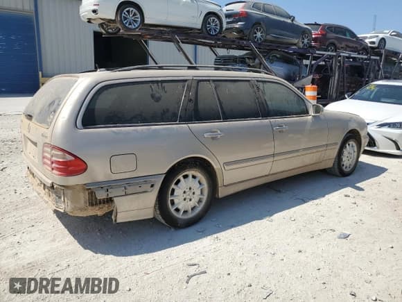 ✅ 2003 Mercedes-Benz E 320/430 4 Matic • VIN: WDBJH82J93X088042 • Lot: 70566864. Listed on Copart with 167,374 mi. Free auction sales archive from the USA and detailed vehicle history report at DreamBid. Image 3.