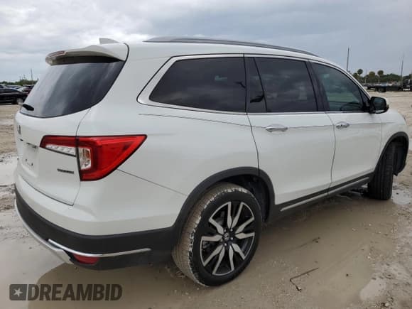 ✅ 2022 Honda Pilot Touring 7-Passenger • VIN: 5FNYF5H65NB030899 • Lot: 67962524. Listed on Copart with 34,124 mi. Free auction sales archive from the USA and detailed vehicle history report at DreamBid. Image 3.