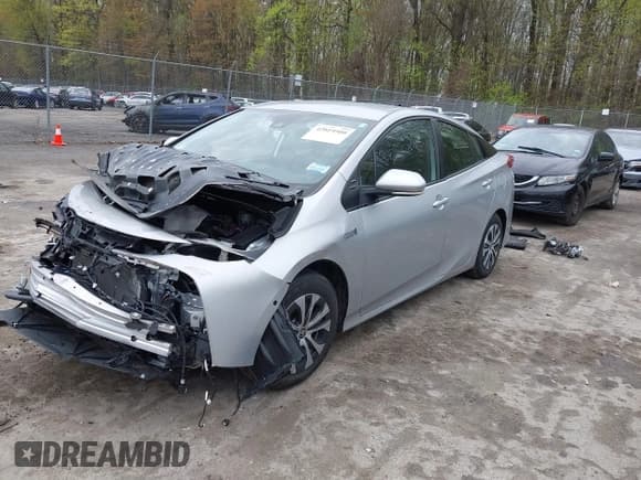 ✅ 2021 Toyota Prius LE • VIN: JTDKAMFP0M3194485 • Lot: 42019500. Listed on IAAI with 42,191 mi. Free auction sales archive from the USA and detailed vehicle history report at DreamBid. Image 17.