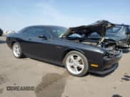 ✅ 2009 Dodge Challenger R/T • VIN: 2B3LJ54T09H641350 • Lot: 74468334. Wystawiony na Copart z przebiegiem 64 001 mil. Bezpłatny archiwum sprzedaży aukcyjnych z USA i szczegółowy raport historii pojazdu na DreamBid. Zdjęcie 4.