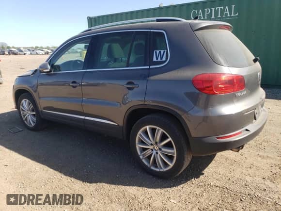 2013 Volkswagen Tiguan SE z VIN WVGAV7AX7DW018388, wystawiony jako Copart lot #56188045 z przebiegiem 98 066 mil mil oraz Szkoda całkowita • Salvage title. Historia ofert i sprzedaży dostępna na DreamBid. Obrazek 2.