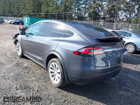 ✅ 2019 Tesla Model X P100D • VIN: 5YJXCBE44KF180391 • Lot: 41690866. Listed on IAAI with 57,863 mi. Free auction sales archive from the USA and detailed vehicle history report at DreamBid. Image 3.