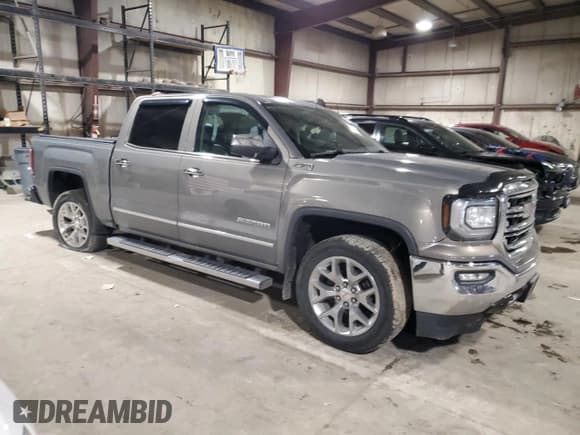 ✅ 2017 GMC Sierra 1500 SLT • VIN: 3GTU2NEC1HG269269 • Lot: 92430145. Listed on Copart with 72,664 mi. Free auction sales archive from the USA and detailed vehicle history report at DreamBid. Image 4.