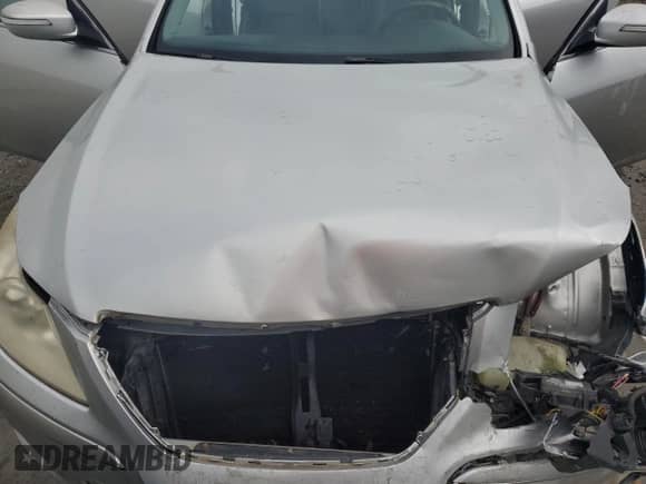 2009 Hyundai Genesis z VIN KMHGC46F39U029308, wystawiony jako Copart lot #73496114 z przebiegiem 173 098 mil mil oraz Szkoda całkowita • Salvage title. Historia ofert i sprzedaży dostępna na DreamBid. Obrazek 12.