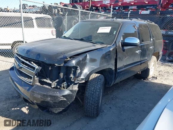 ✅ 2013 Chevrolet Tahoe LTZ • VIN: 1GNSCCE07DR169385 • Lot: 41899972. Listed on IAAI with 132,005 mi. Free auction sales archive from the USA and detailed vehicle history report at DreamBid. Image 2.