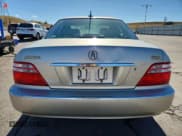 ✅ 2004 Acura RL w/Navigation System • VIN: JH4KA96604C001559 • Lot: 86876305. Wystawiony na Copart z przebiegiem 86 748 mil. Bezpłatny archiwum sprzedaży aukcyjnych z USA i szczegółowy raport historii pojazdu na DreamBid. Zdjęcie 6.