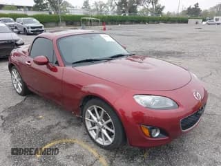 ✅ 2012 Mazda MX-5 Miata Grand Touring • VIN: JM1NC2PF9C0222253 • Lot: 42024121. Listed on IAAI with 49,036 mi. Free auction sales archive from the USA and detailed vehicle history report at DreamBid. Image 1.