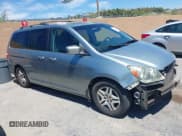 ✅ 2005 Honda Odyssey EX-L • VIN: 5FNRL38785B103323 • Lot: 43040282. Listed on IAAI with 288,118 mi. Free auction sales archive from the USA and detailed vehicle history report at DreamBid. Image 1.