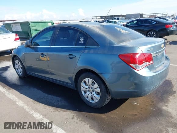 ✅ 2012 Chevrolet Cruze LS • VIN: 1G1PC5SHXC7271139 • Lot: 41441993. Listed on IAAI with 140,440 mi. Free auction sales archive from the USA and detailed vehicle history report at DreamBid. Image 3.