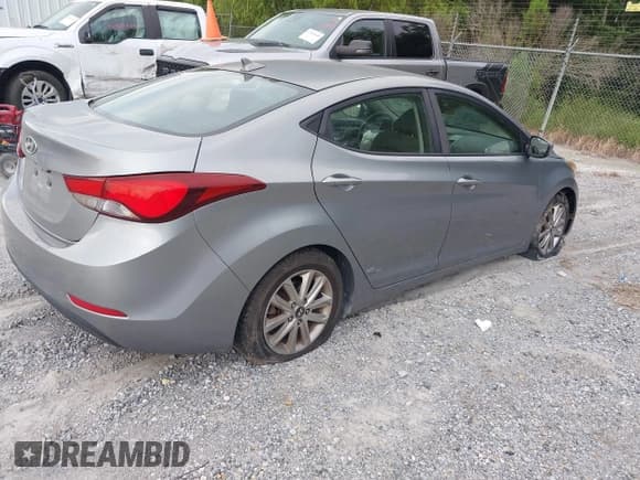 ✅ 2015 Hyundai Elantra SE • VIN: KMHDH4AE6FU325759 • Lot: 42801864. Listed on IAAI with 171,437 mi. Free auction sales archive from the USA and detailed vehicle history report at DreamBid. Image 4.