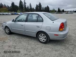 2005 Hyundai Accent GLS z VIN KMHCG45C75U639281, wystawiony jako Copart lot #54887095 z przebiegiem 136 090 mil mil oraz Szkoda całkowita • Salvage title. Historia ofert i sprzedaży dostępna na DreamBid. Obrazek 2.